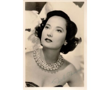 Actress Merle Oberon signed vintage 7 x 5 inch b/w portrait photo. Est.