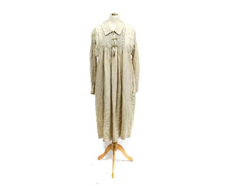 Early 20th Century Linen Farmers Smock, with collar, button fastening, side pockets, smocked details to the bodice, back and 