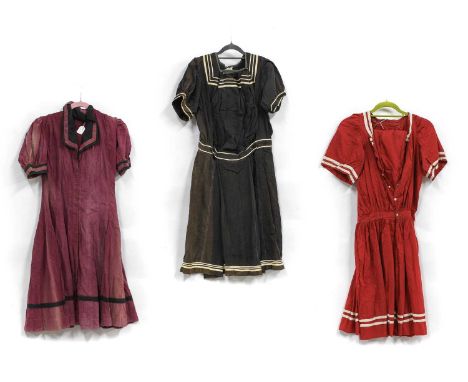 Three Edwardian Two Piece Cotton Bathing Suits, comprising a turkey red example with short sleeves, round neck, button fasten