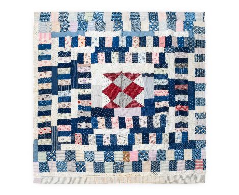 Late 19th Century Patchwork Quilt, including vibrant blue and white abstract and floral printed patches, other fabrics includ