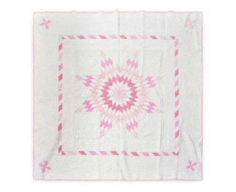 Late 19th Century Patchwork Quilt, comprising a central blazing star using diamond patches in white and pink, within a simila