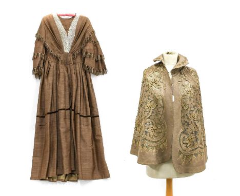 A Mid 19th Century Brown Silk Fine Striped Dress with a lace and shawl-style mount to the bodice, multi-pleated to the centre