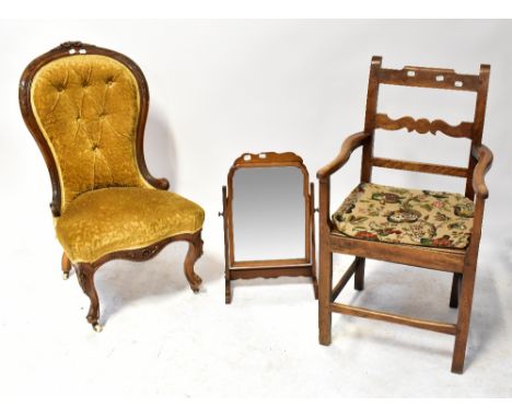 A Victorian walnut button back nursing chair with carved floral surmount, a mahogany swing dressing table mirror with shaped 