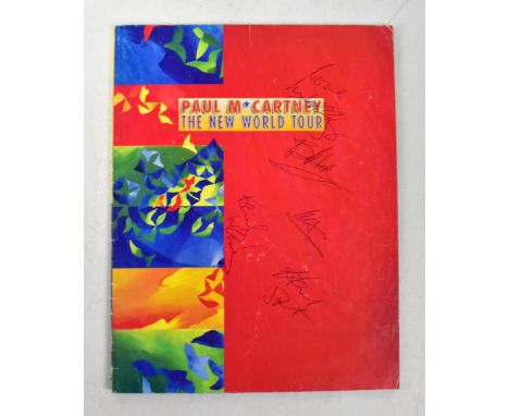PAUL MCCARTNEY; 'The New World Tour', signed to front cover.We have not authenticated these signatures, please satisfy yourse