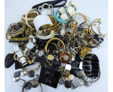 A large quantity of vintage and modern costume jewellery to include bracelets, cufflinks, earrings, ladies' watches, etc.