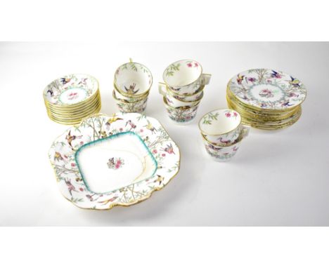 MINTON: a part tea service in the Chinoiserie style, hand painted with storks, bamboo and flora, to include a sandwich plate,