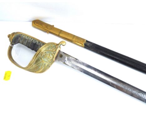 A George V Naval officer's sword, marked for 'James Cracknell Outfitters Portsmouth', with etched blade, brass hilt with scab