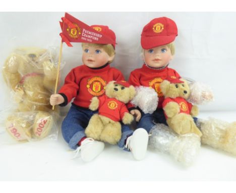 STEIFF; a 1902/2002 Official Manchester United Teddy bear with winner's gold medallion to ribbon around neck, length 25cm, no