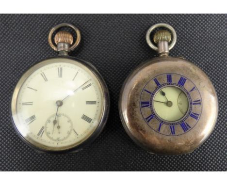 Two hallmarked silver pocket watches comprising a crown wind demi-hunter example, the white enamelled dial set with Roman num