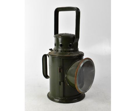 A Bladon of Birmingham green military lantern, No.JA0999, 1962, height 35cm.