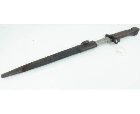 A German Model 1884 knife bayonet, marked 'J A Henckels', in steel scabbard, blade length 24.5cm.