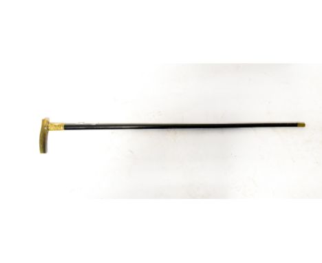 An ebonised walking stick with 18ct gold hallmarked collar repoussé decorated with Rococo-style scrolls, blank cartouche stam
