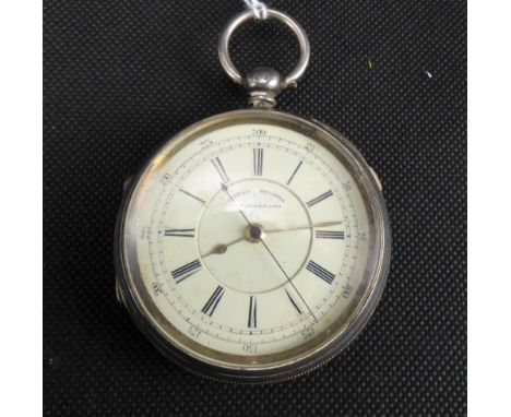 CENTRE SECONDS; a hallmarked silver key wind chronograph open face pocket watch, the dial set with Roman numerals and outer m