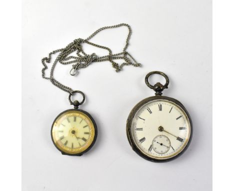 Two late 19th century hallmarked silver open face pocket watches, the smaller example with gilt outer border, the white dial 