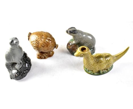 BESWICK; three miniature animal decanters designed by Peter Thomson containing Beneagles Scotch Whisky, comprising Loch Ness 