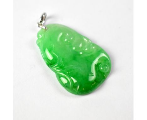 A green jade rectangular pendant with abstract design, length 3cm. CONDITION REPORT: No chips or cracks , depth 3mm