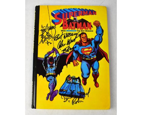 DC COMICS; 'Superman & Batman Annual', signed Burt Ward, and Adam West,.We have not authenticated these signatures, please sa