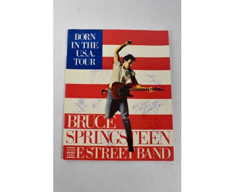 BRUCE SPRINGSTEEN; 'Born In The USA' tour programme, signed, with ticket stub (2).We have not authenticated these signatures,