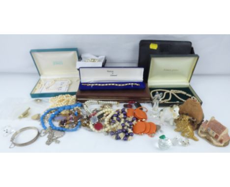 Various items of modern and vintage costume jewellery to include silver bracelets, simulated pearl necklaces, Swarovski silve