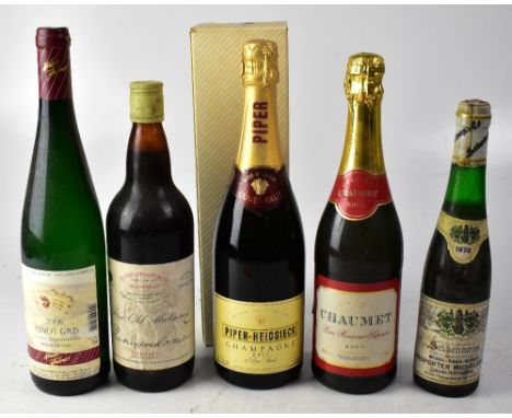 A boxed bottle of Piper-Heidsieck champagne, a Chateau Chaumet Loire Mousseux Superior Brut, a 1976 Seidenhaus sparkling wine