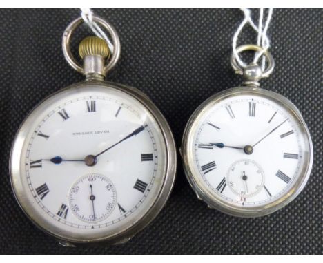 Two hallmarked silver open face pocket watches comprising a small crown wind English lever, the white enamelled dial set with