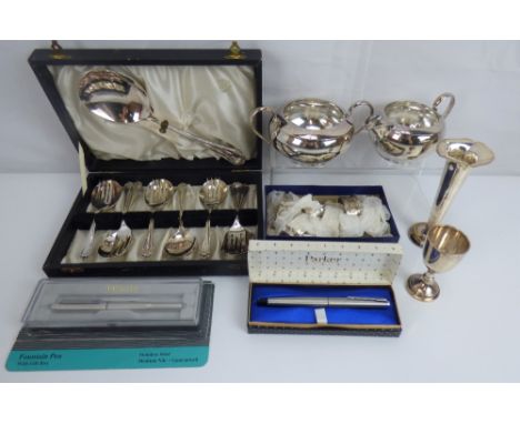 Various mixed collectibles to include two Parker pens, a hallmarked silver egg cup, silver plated small stem vase, milk and s