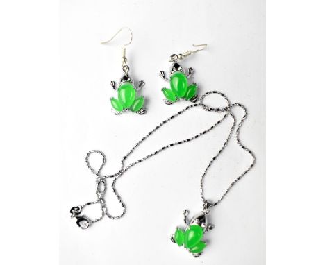 A sterling silver and jadeite necklace and earring jewellery suite. 