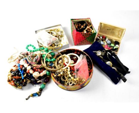 A quantity of costume jewellery to include a long silver chain link necklace, other white metal jewellery, various costume wa