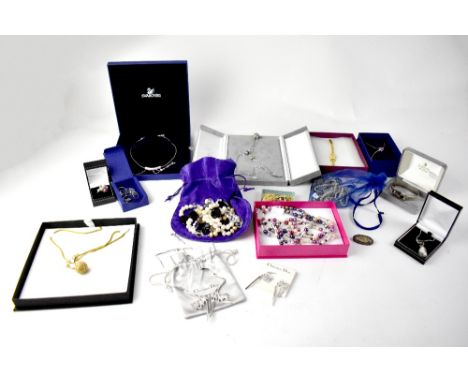 SWAROVSKI; a quantity of boxed jewellery to include white metal crystal pendant, white metal and pink crystal necklace with c