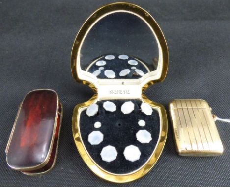 A gentlemen's vintage collar and stud set with mother of pearl in hexagon heads, a lacquered papier-mâché snuff box with yell