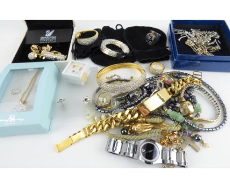 Various items of modern costume jewellery to include Swarovski, silver cross, gold plated rings, silver rings, hinged bracele