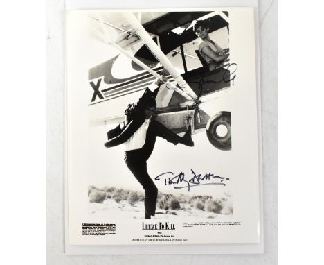 JAMES BOND 007; 'A Licence to Kill', black and white promotional photograph bearing signatures of Timothy Dalton and Cary Low