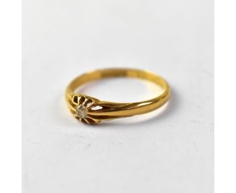 A vintage 18ct gold ring, tiny diamond set head with split shoulders, size O, approx 1.8g.