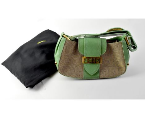 FENDI; a brown canvas bag with Fendi logo and mint green leather trim, yellow metal Fendi logo hardware and studs to the base