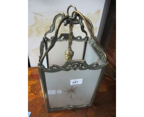 A BRASS AND FROSTED GLASS SINGLE LIGHT HALL LANTERN of rectangular form 38cm (h) x 20cm (s)