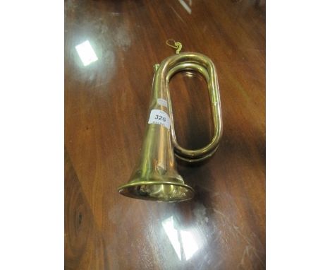A COPPER AND BRASS BUGLE inscribed "Class A Boosey & Company London"