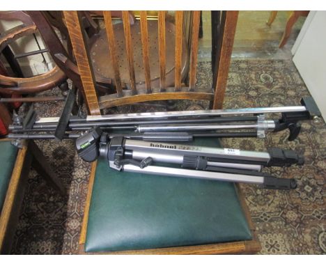 A HAHNEL CAMERA TRIPOD together with an easel