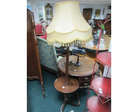 A MAHOGANY FLOOR STANDARD LAMP the reeded column joined by a circular dish raised on tripod support with shade