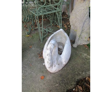 A COMPOSITION STONE PLANTER modelled as a swan 40cm high