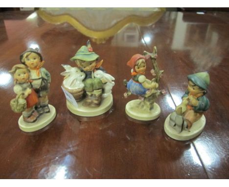 FOUR HUMMEL FIGURES