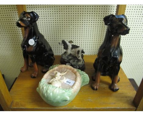 A MISCELLANEOUS COLLECTION OF CHINA to include a sylvac wall posse, a pair of dogs etc (4)