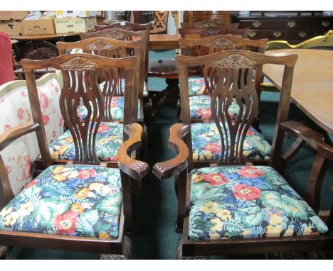 EIGHT CHIPPENDALE STYLE MAHOGANY DINING CHAIRS including a pair of elbow chairs each with a serpentine top rail and pierced v