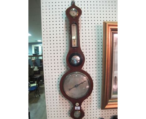 A GEORGIAN MAHOGANY BANJO BAROMETER with silvered dials inscribed "P Fringle Cork" 82cm high