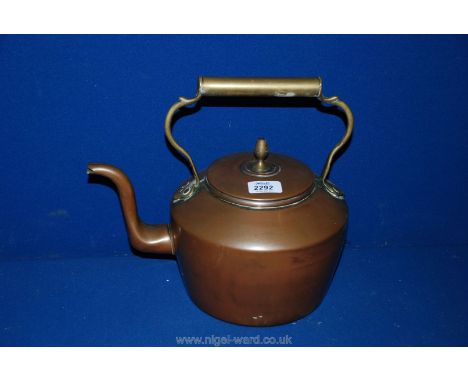 A Copper Kettle with acorn finial.