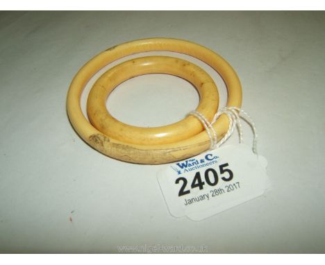 An ivory Bangle and an ivory Teething ring