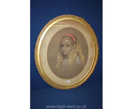 A 19th c. portrait in oval gilt frame.