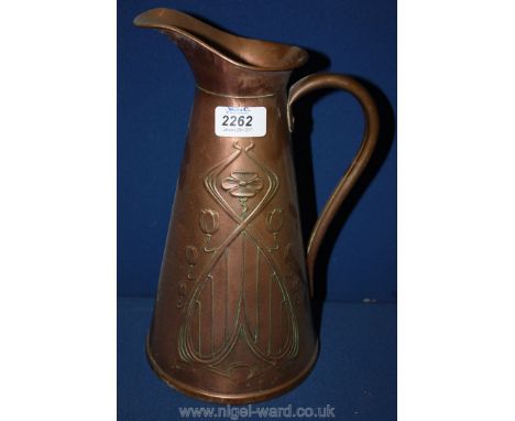 An Art Nouveau Copper Jug by J.S. & D., 11 1/4'' high.