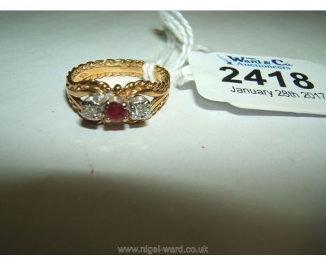 An 18ct. Gold Ring set with small stones including two Diamonds and a Ruby