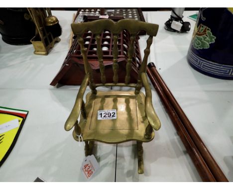 Polished bronze rocking chair, H: 25 cm. P&amp;P Group 3 (£25+VAT for the first lot and £5+VAT for subsequent lots) 
