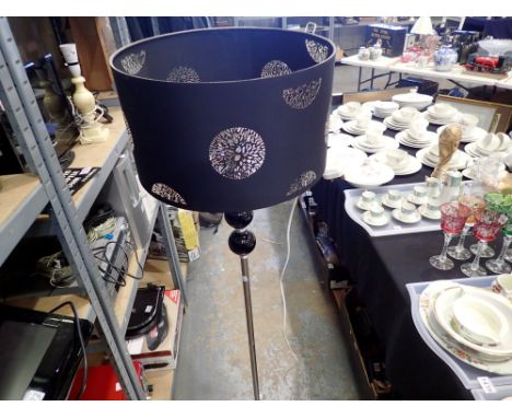 Brushed steel and black floor standing lamp with black shade. Not available for in-house P&amp;P 